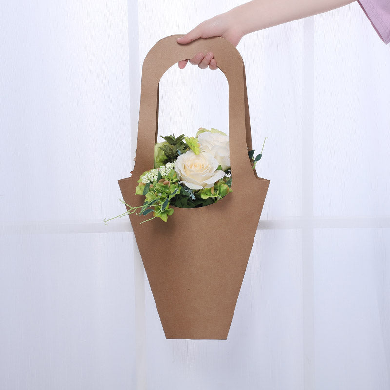 Flower bouquet wrapped in brown paper kept hand Vector Image